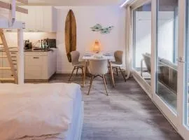 Surfers Deck near Interlaken, at lake with pool