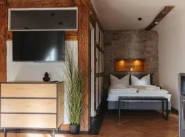 Lehm & Fachwerk 1-Zimmer-Apartment - Claycation