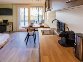 Surfers Oase near Interlaken at lake with pool