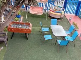 Encanto azul Jardín, Parrilla y juegos