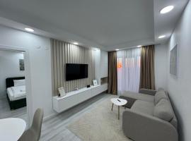 Luna Place，位于Tunari的酒店