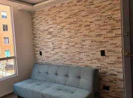 Hermoso y acogedor apartamento en conjunto cerrado，位于伊瓦格的酒店