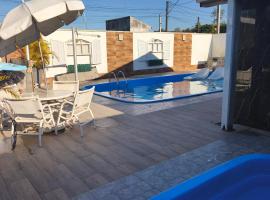 Lá casa de Cristal, Casa com piscina matinhos，位于马蒂尼奥斯的酒店