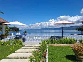 Juma cottages，位于图克图克的带泳池的酒店