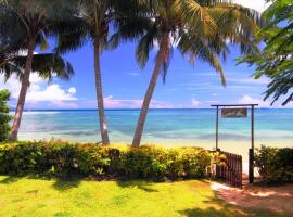 椰林海滨小屋度假村，位于马太彩虹礁附近的酒店