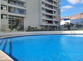 Rinconcito Costero - Parking y Piscina Gratis，位于伊基克的带泳池的酒店