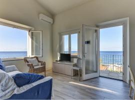 Trilocale Montecristo - vista su mare e tramonti，位于波蒙特的海滩酒店