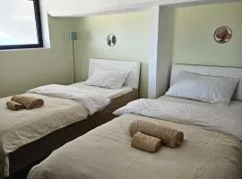 Soulnest Light bedroom and shared bathroom