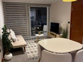 Frente a Playa Brava, Cerca Cavancha, WiFi，位于伊基克的带停车场的酒店