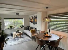 Casa Dekker on natural swimming water with private jetty