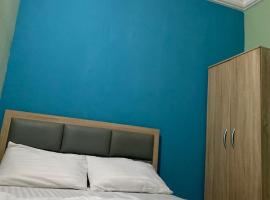 Dominion Apartment and Guest House，位于Osese的酒店