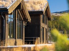 Ny og moderne hytte med sauna, jacuzzi og eget spillrom med biljard og dart Gratis elbillading og strøm inkludert i prisen，位于弗洛的酒店