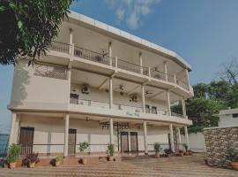 Capital O Gulmohar Marriage Garden，位于丹巴德的酒店