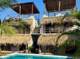 Mis Hibis，位于El Naranjo的带停车场的酒店