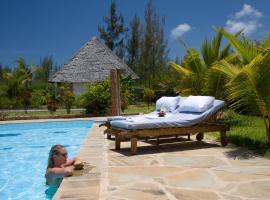 Sheba Cottages - Diani Beach，位于迪亚尼海滩的酒店