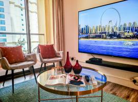 La Buena Vida Holiday Homes - Modern, Luxe & Spacious 4-Bed, Full Kitchen, near to Beach, Tram & Marina，位于迪拜的分契式公寓