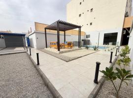 Tamyoz Aqama for Serviced Apartments，位于哈伊勒的带泳池的酒店