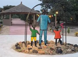 JAC Tropical Lodge - Bar, Restaurant, Massages, Plage, Nature, Excursions - Ressourcement et paix dans un paradis naturel et de confort les pieds dans l'eau - Respirez, vous êtes chez JAC - Navettes privées Banjul Aéroport