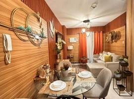 Modern 1 BR Condo near Airport, MOA, PICC, Star City, OKADA With Fast WIFI & Netflix Free Pool Access，位于Sampong的酒店