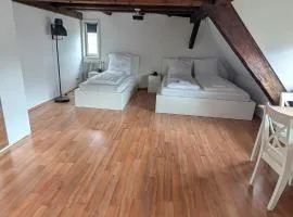 Triple room in a historic half-timbered house