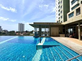 Lumpini Ville Naklua Select Resort Pool condo，位于北芭堤雅的酒店