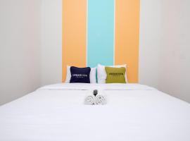 Urbanview Hotel Simple near Pakuwon Mall Jogja，位于Seturan的酒店