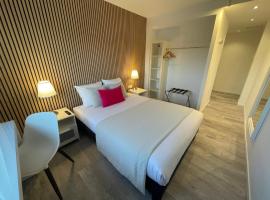 Hôtel les Coulisses，位于福尔巴克的酒店