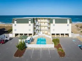 Beachfront Condo with Ocean Views and Pool Access