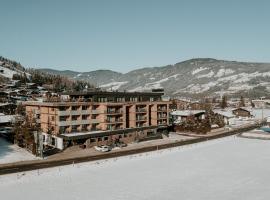 AlpenParks Hotel & Apartment Taxacher，位于蒂罗尔-基希贝格的酒店