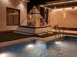 Pool Chalet W Green Garden & BBQ Relax，位于利雅德的酒店