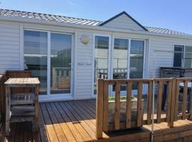 NORDSEE GLAMPING Mobilheim Chalet 2294，位于布列登的酒店