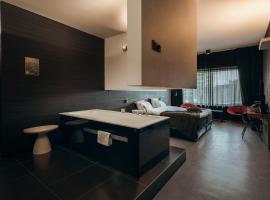 卡本酒店，位于亨克的酒店