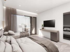 Coralli Beachfront，位于佩基罗德的酒店