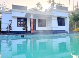 Grand Glorious Resort，位于Padinjarathara的酒店