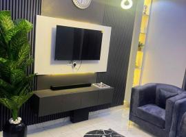 Deluxe One Bedroom Apartment，位于伊凯贾的酒店