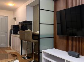The UrbanNest - 1BR Condo in Marina Spatial, Dumaguete with free fast WiFi and Pool，位于Piapi的酒店