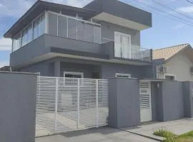 Sobrado Inteiro pé na areia em Itapoá!