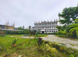 Taj Heritage Hotel and Restatrant 94353-50876，位于焦尔哈德的酒店