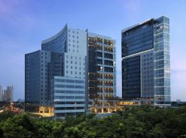 泗水提木尔沙马托诺富特酒店，位于泗水的酒店