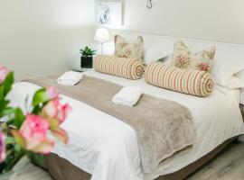 马车车轮乡村山林小屋，位于博福特西的带停车场的酒店