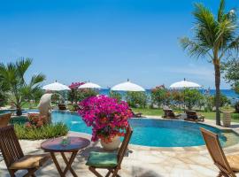 巴厘岛艾湄海滩棕榈花园及Spa度假酒店，位于艾湄湾的度假村