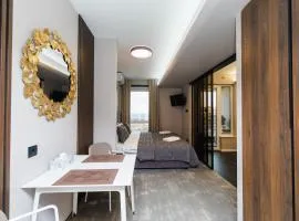 Luxury Airport Studio with Balcony Cozy & Modern