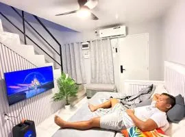 Exclusive 2-bedroom Townhouse with Fast Wi-Fi Netflix Disney Plus Prime Video near Toril Bago Gallera Ulas