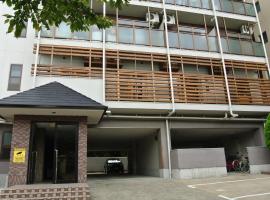 日本高槻同德努萨背包客旅馆，位于高槻市的酒店