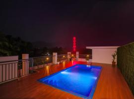 Munderi Green Mounts Peaceful Family Pool Stay near Kalpetta, Wayanad，位于卡尔佩特塔的酒店