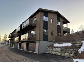 Motoppen Trysil Apartments，位于特吕西尔的带停车场的酒店