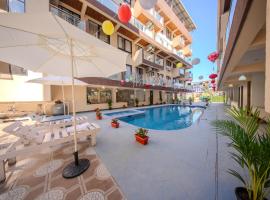 La Bela Casa Suites, Candolim，位于坎多林的酒店