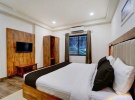 Hotel O OZONE Residency，位于科泽科德的酒店