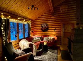 Atmospheric log cabin by the ski tracks，位于易拉斯加威的酒店