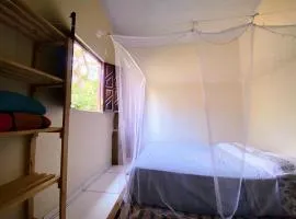 Quarto acolhedor para mulheres no Vale do Capão